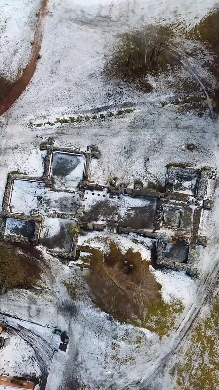 Aerial view of snow-covered ruins in Oslo’s old city centre